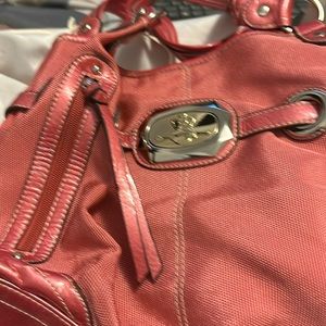 It’s a Kathy Van Zeeland bag never been use or worn